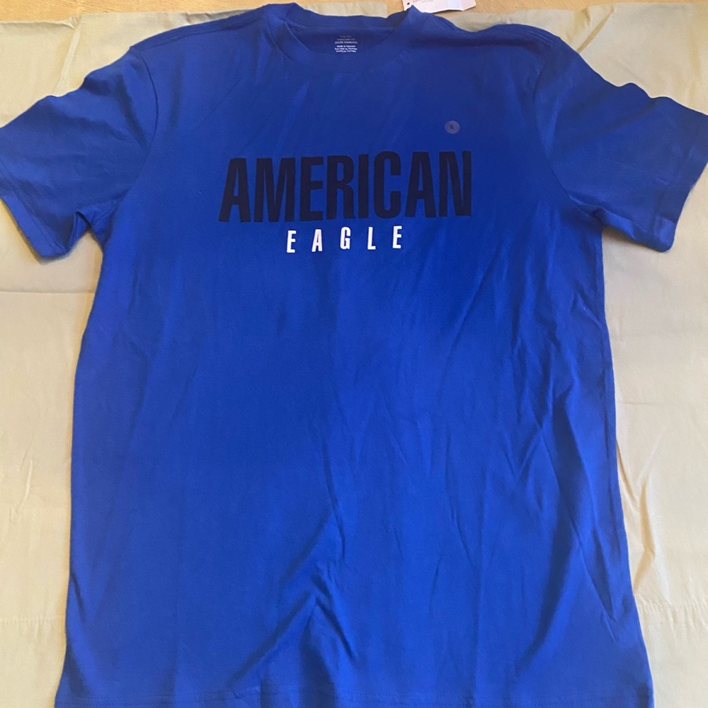 American Eagle T-shirt  Blue and black writing